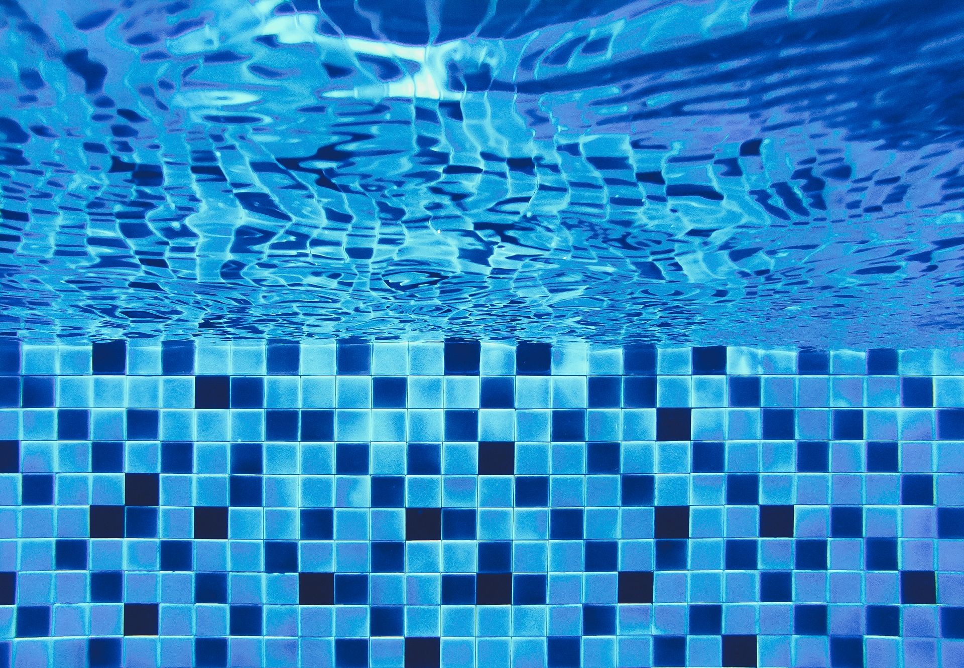  underwater in the swimming pool and mosaic tiles blend ocean